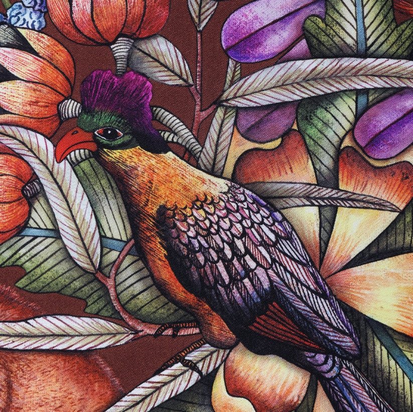 A section featuring an iridescent turaco bird perched within the dense tropical scene, adding a touch of elegance and movement.