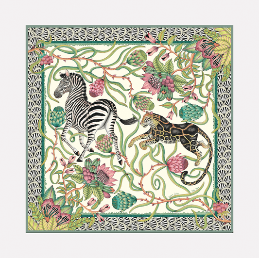 A luxurious silk scarf featuring a safari-inspired design with zebras, leopards, and intricate floral patterns, set against a soft stone-coloured background with a decorative border.