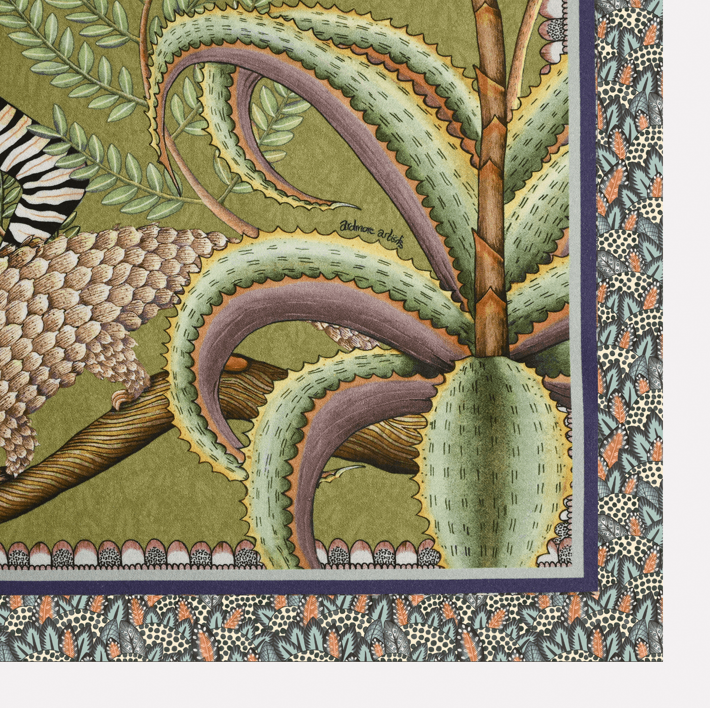 A zoomed-in corner section of the Ardmore Thanda Stripe Napkin in Delta, featuring delicate floral patterns and lush green foliage with subtle texture details.