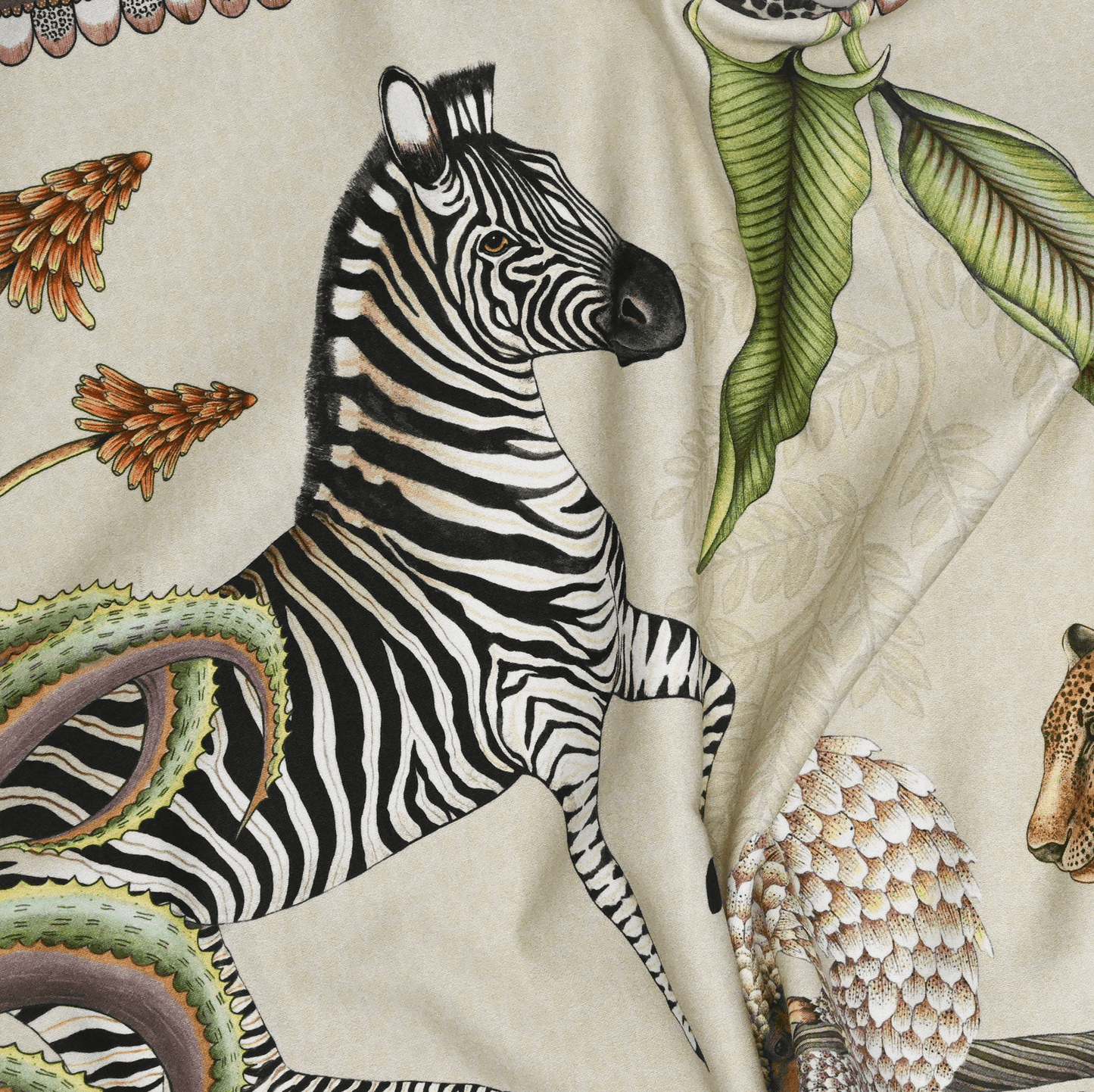 A close-up highlighting a combination of flora and fauna, including exotic plants and hidden animals in the design.
