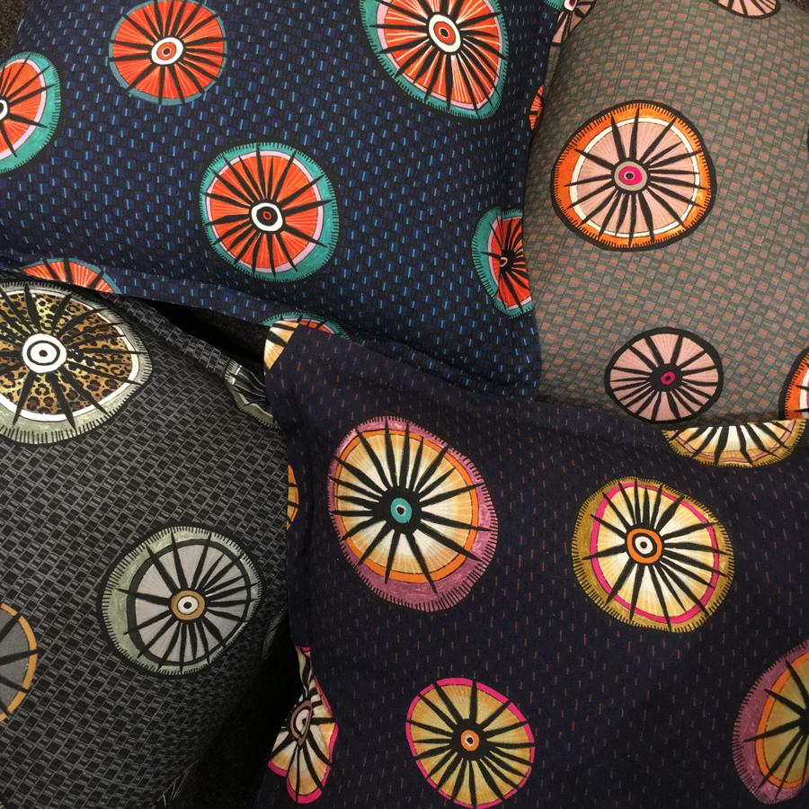 A collection of Amasumpa cushions in various colourways, displayed together to show how they can be styled in combination.