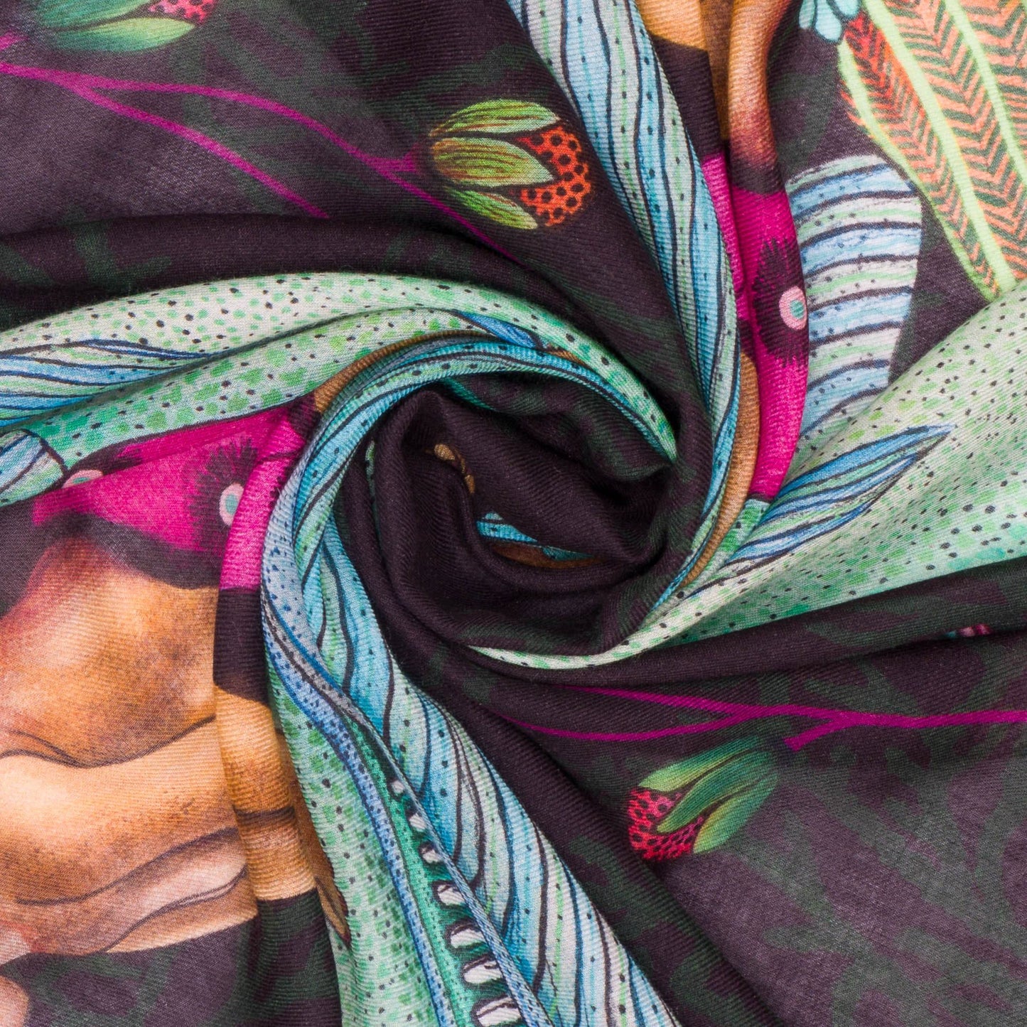 A twisted section of the wrap showcasing its lightweight, soft texture, and intricate print details.