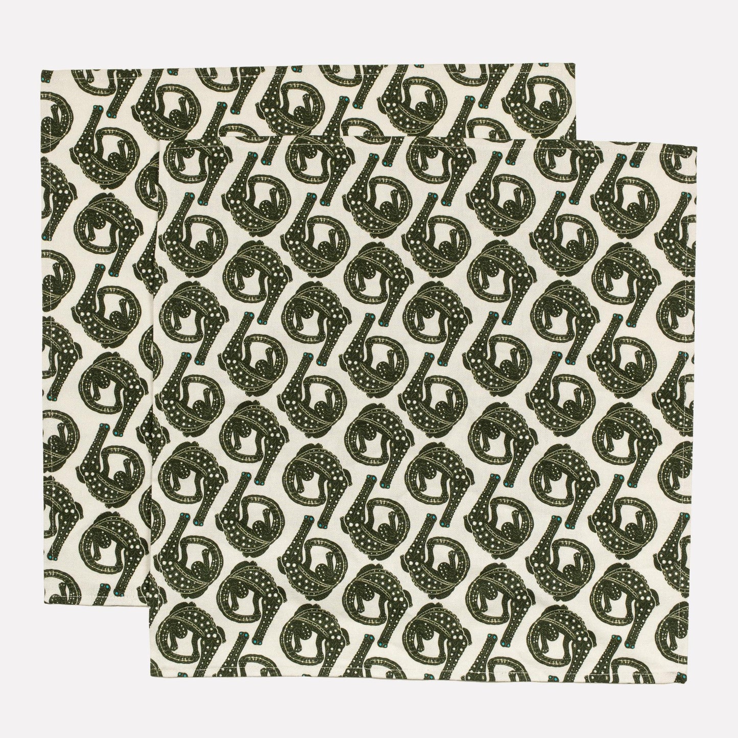 An extreme close-up of the Ardmore Croco napkin in Charcoal on Bleached pair, capturing the intricate repeating pattern and the premium linen-cotton texture.