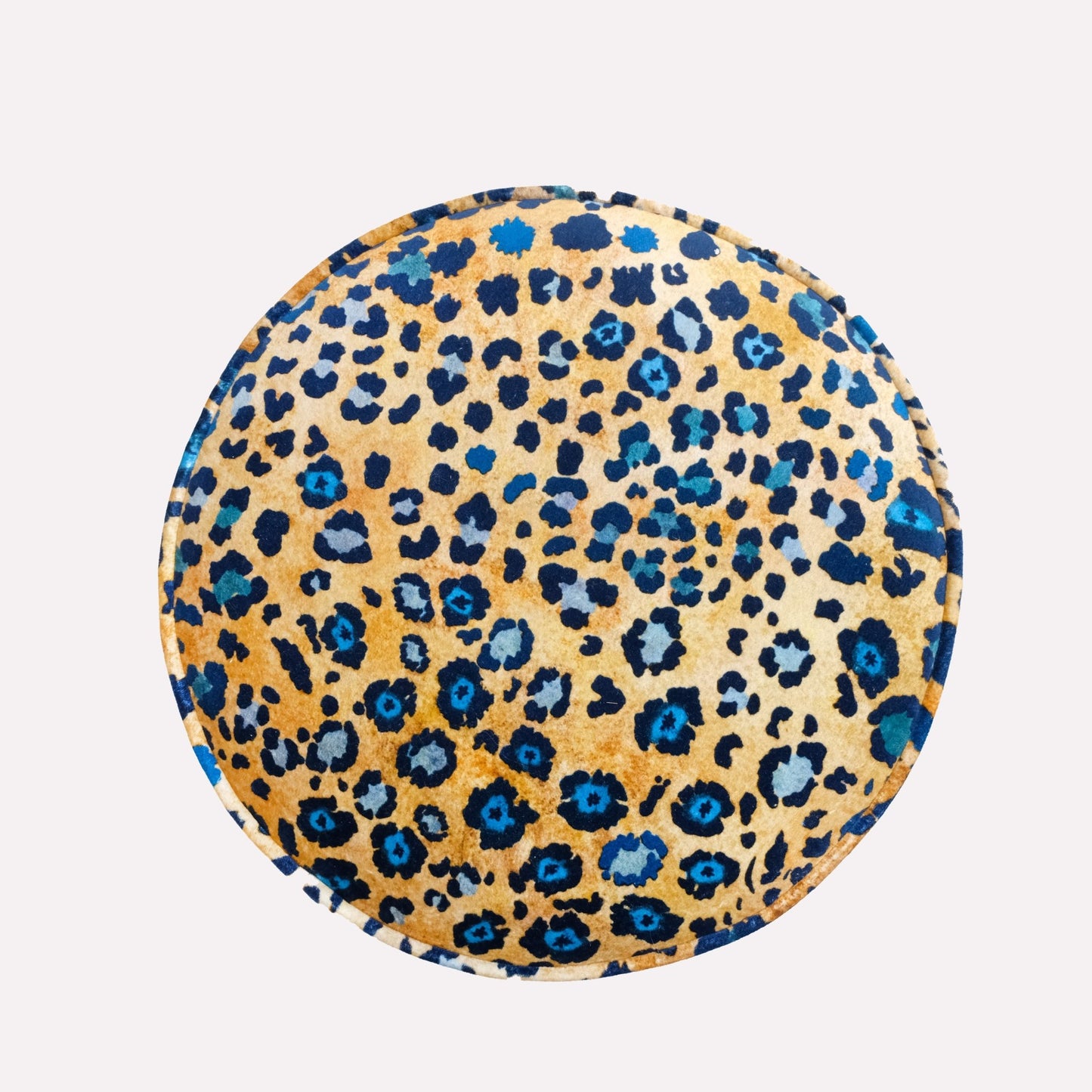 Displaying the symmetry and intricate detailing of the Safari Spot motif, emphasising the rich contrast between the midnight blue and golden tones.