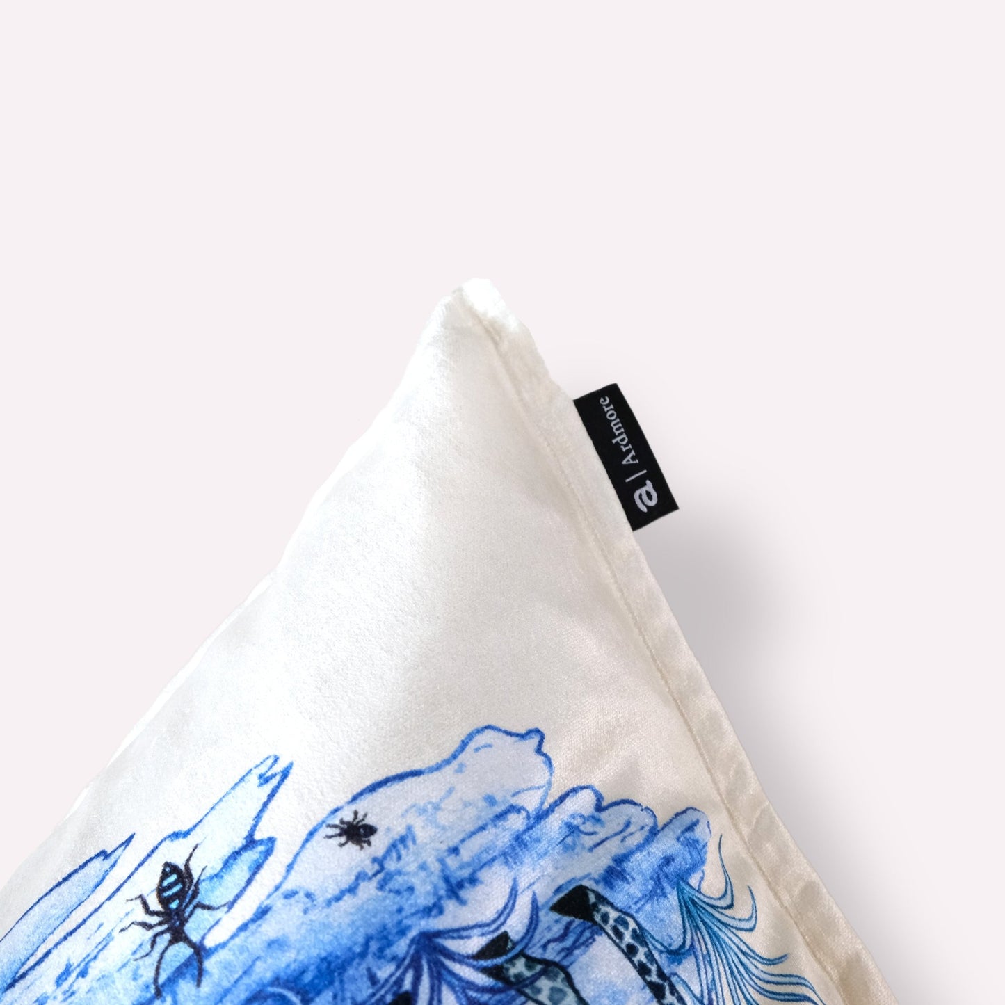 Side view displaying the cushion’s double-sided velvet print, fine stitching, and soft texture, with a focus on the high-quality craftsmanship.