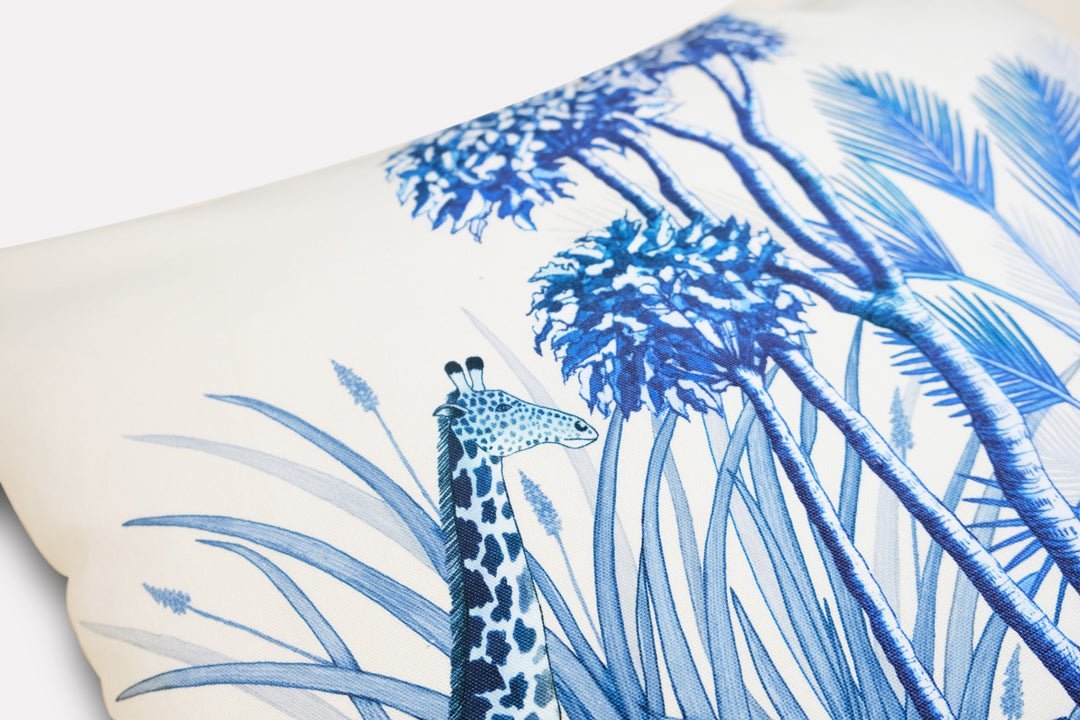 A close-up of the hand-drawn elephant artwork, emphasising the cushion’s fine design and rich Tanzanite blue hues.