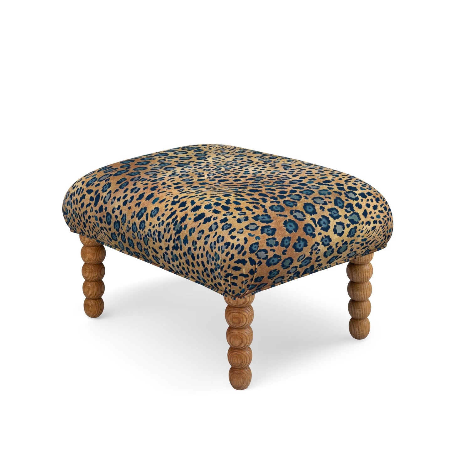 A luxurious Kudu Pod Ottoman from Ardmore, upholstered in Safari Spot Midnight Velvet. The sumptuous velvet fabric and rich leopard-inspired print make this an opulent statement piece.