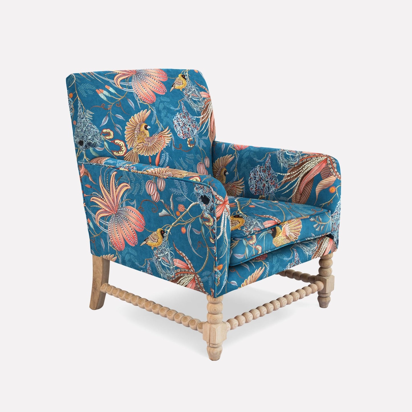 A side view of the Lucky Bean Chair, highlighting its sturdy wooden frame and elegantly curved design. The detailed velvet upholstery exudes African artistry and opulence, making it a refined statement piece for any sophisticated interior.