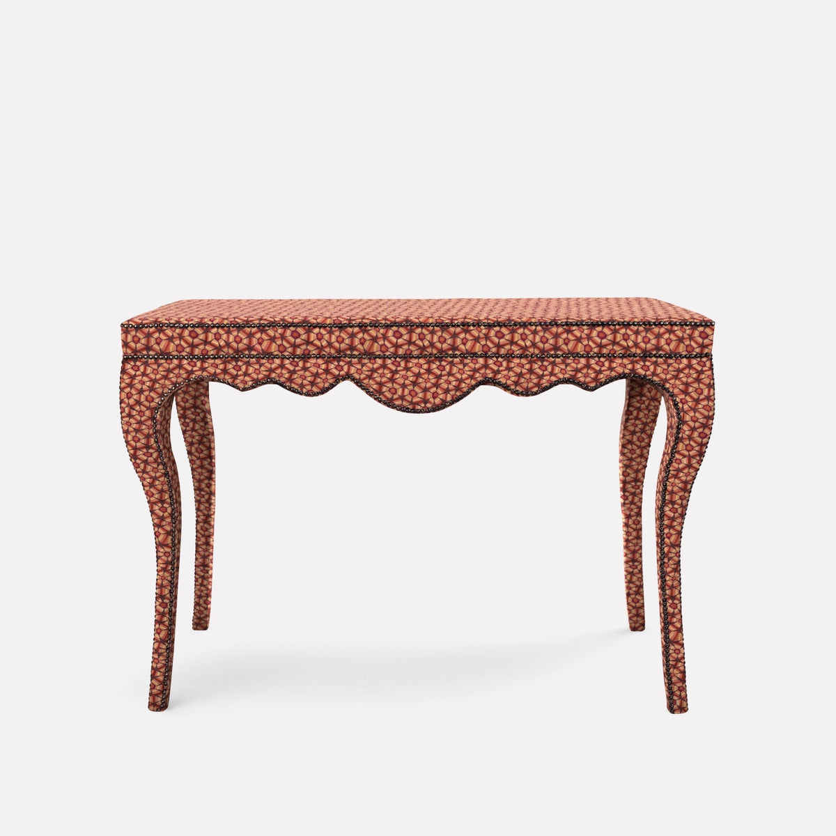 A luxurious Nyala Table adorned in Thanda Tortoise Plum Linen, featuring an elegant sculptural design inspired by Nyala antelope horns. The table is topped with a sleek glass surface, complementing its intricate African-inspired craftsmanship.