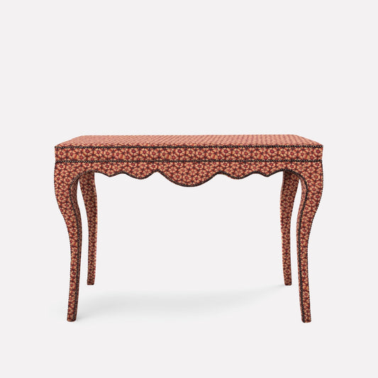 A luxurious Nyala Table adorned in Thanda Tortoise Plum Linen, featuring an elegant sculptural design inspired by Nyala antelope horns. The table is topped with a sleek glass surface, complementing its intricate African-inspired craftsmanship.