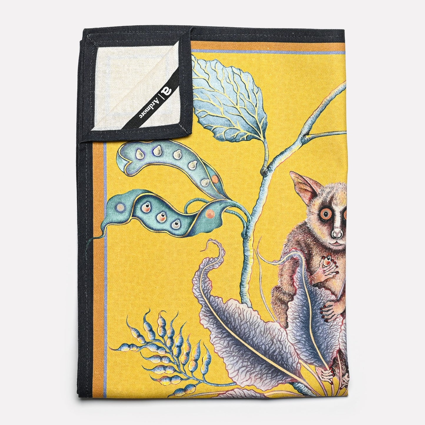 A neatly folded towel emphasising its high-quality material and seamless artistic design.