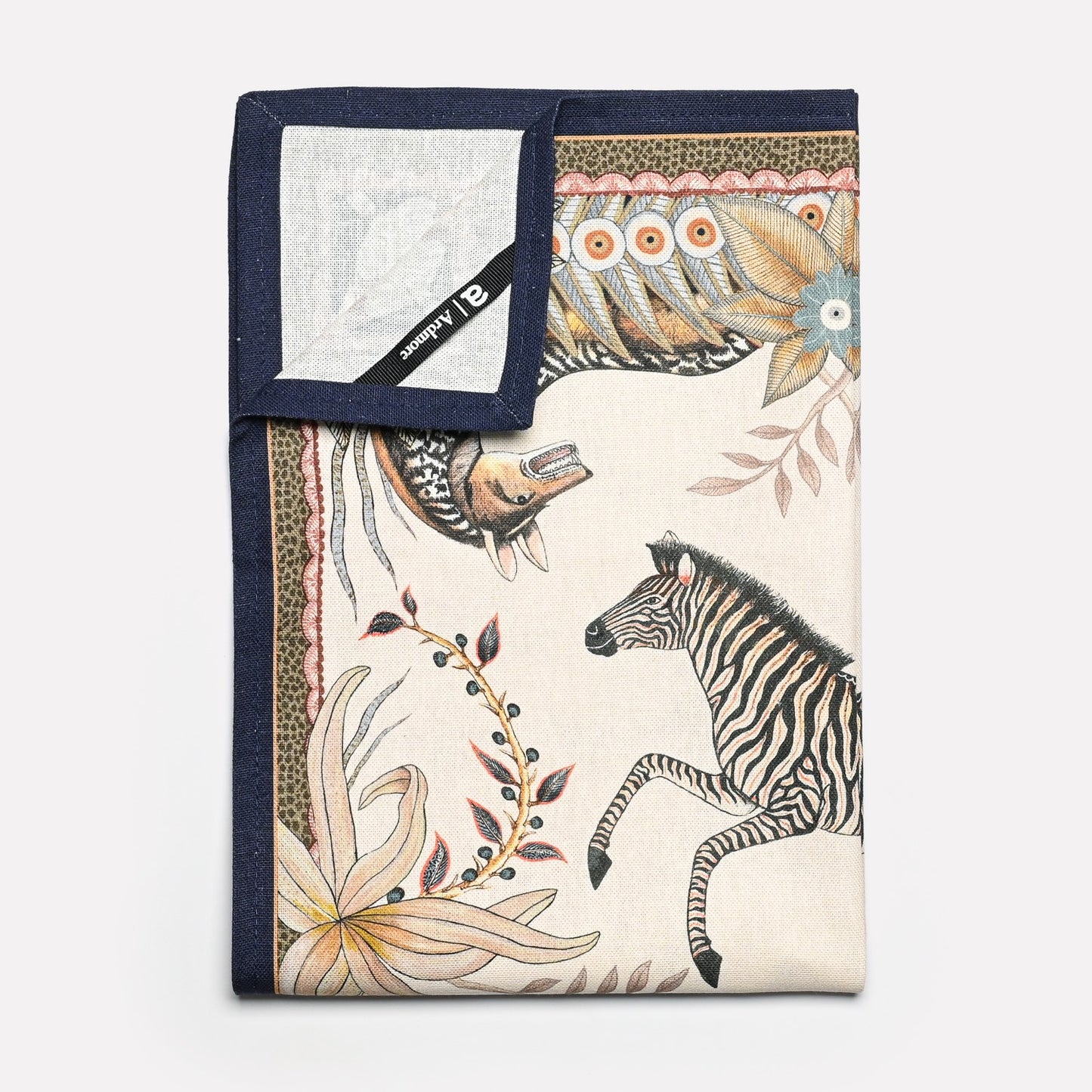 A neatly folded towel emphasising the premium cotton-linen blend and the rich, nature-inspired design.
