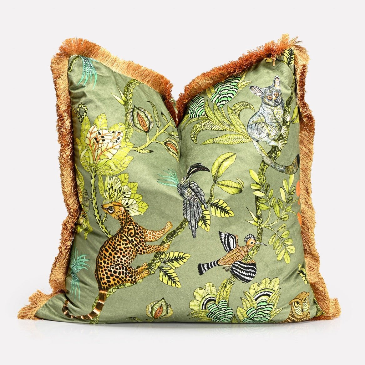 A side perspective showcasing the cushion’s luxurious texture, rich colour palette, and the detailed design wrapping around the edges.
