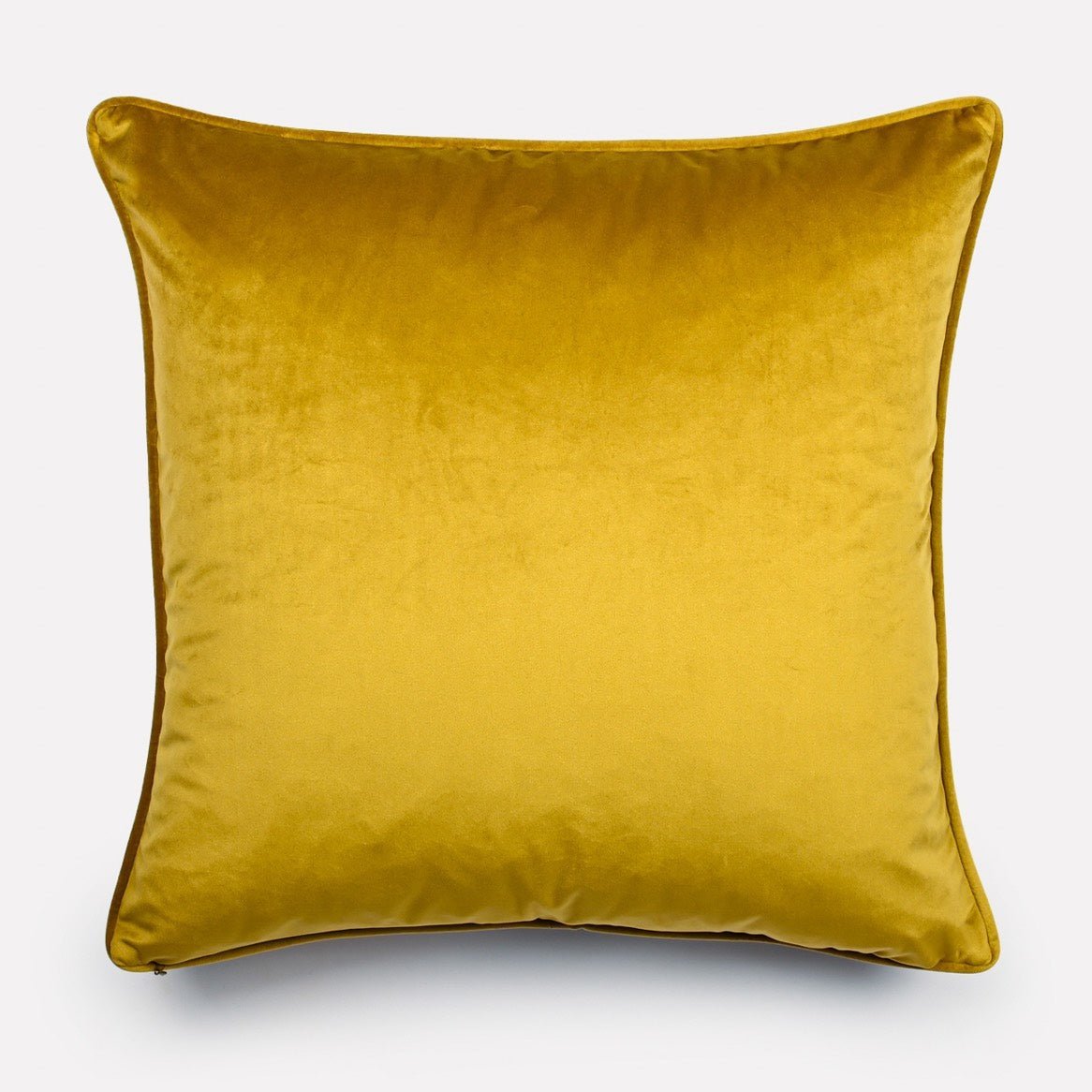Reverse side of the Dancing Elephant Moonlight cushion cover, showcasing a solid gold velvet fabric that complements the intricate front design.