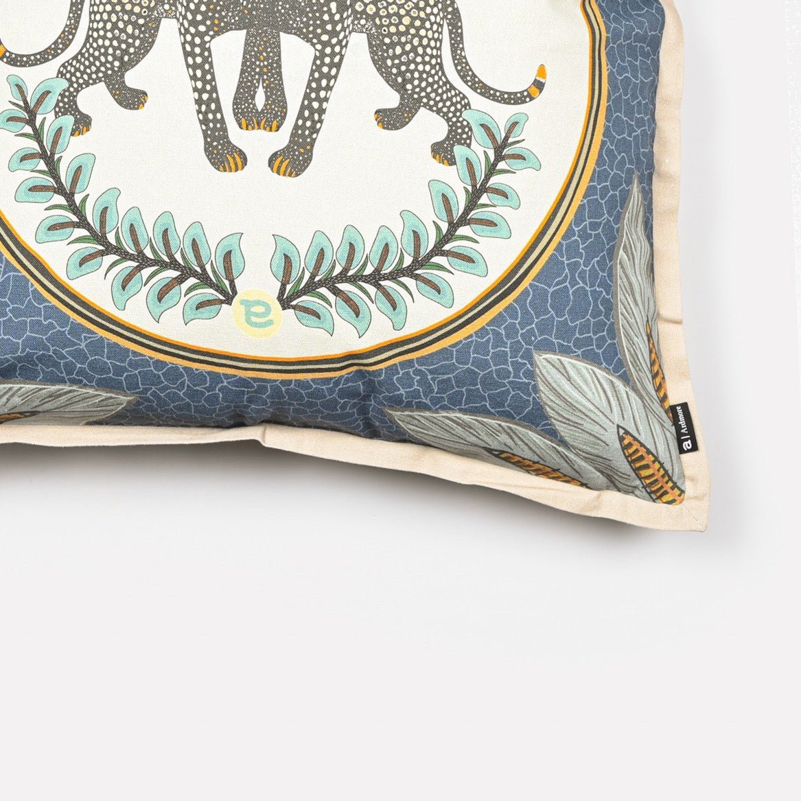 Angled side view of the Heritage & Hope Navy cushion cover showcasing the detailed elephant design and fine trimming.