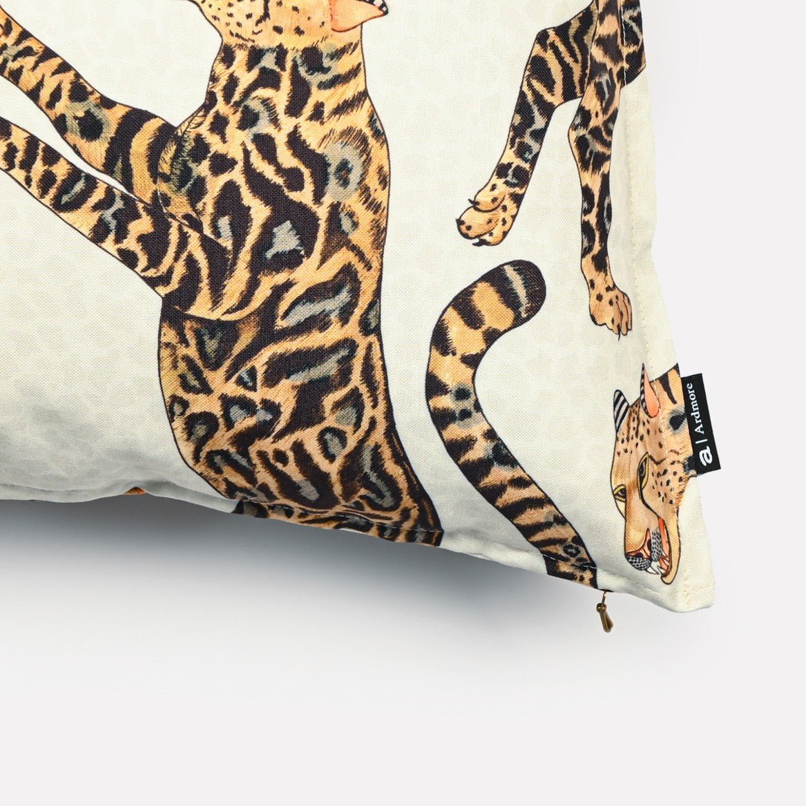 Side view of the Cheetah King Stone cushion cover, highlighting the sleek edge detailing and vibrant cheetah design that extends around the cushion.