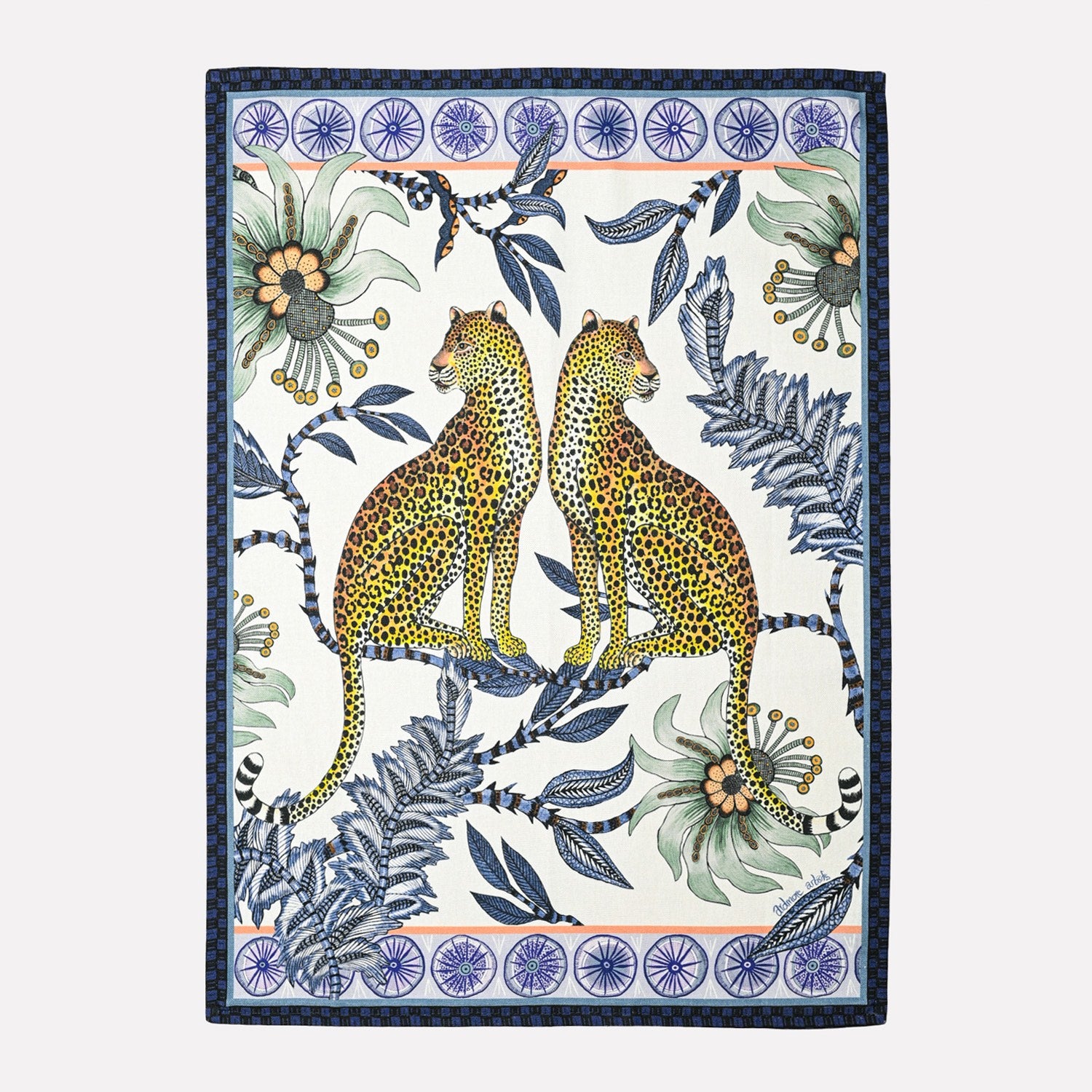 A beautifully crafted tea towel featuring two golden lovebirds with leopard spots, perched among lush floral motifs, framed by an intricate blue border.
