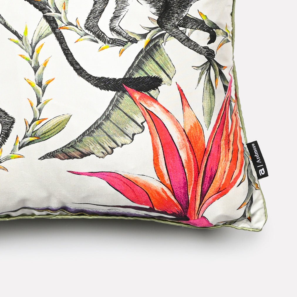 Close-up of the vibrant tropical pattern with monkeys and foliage, showcasing intricate design details and luxurious silk material.