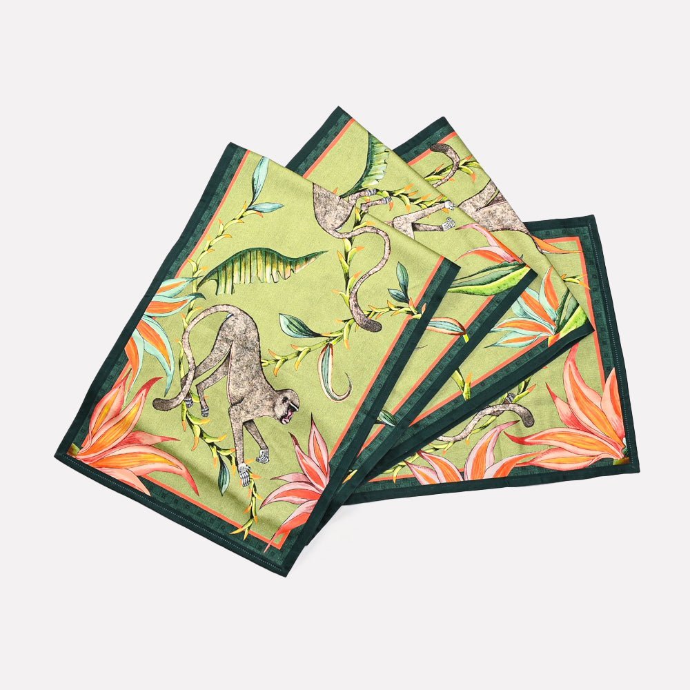A set of Ardmore's Monkey Paradise Runners in a soft Delta colour, featuring intricate artwork of leopards, jackals, and lush greenery.