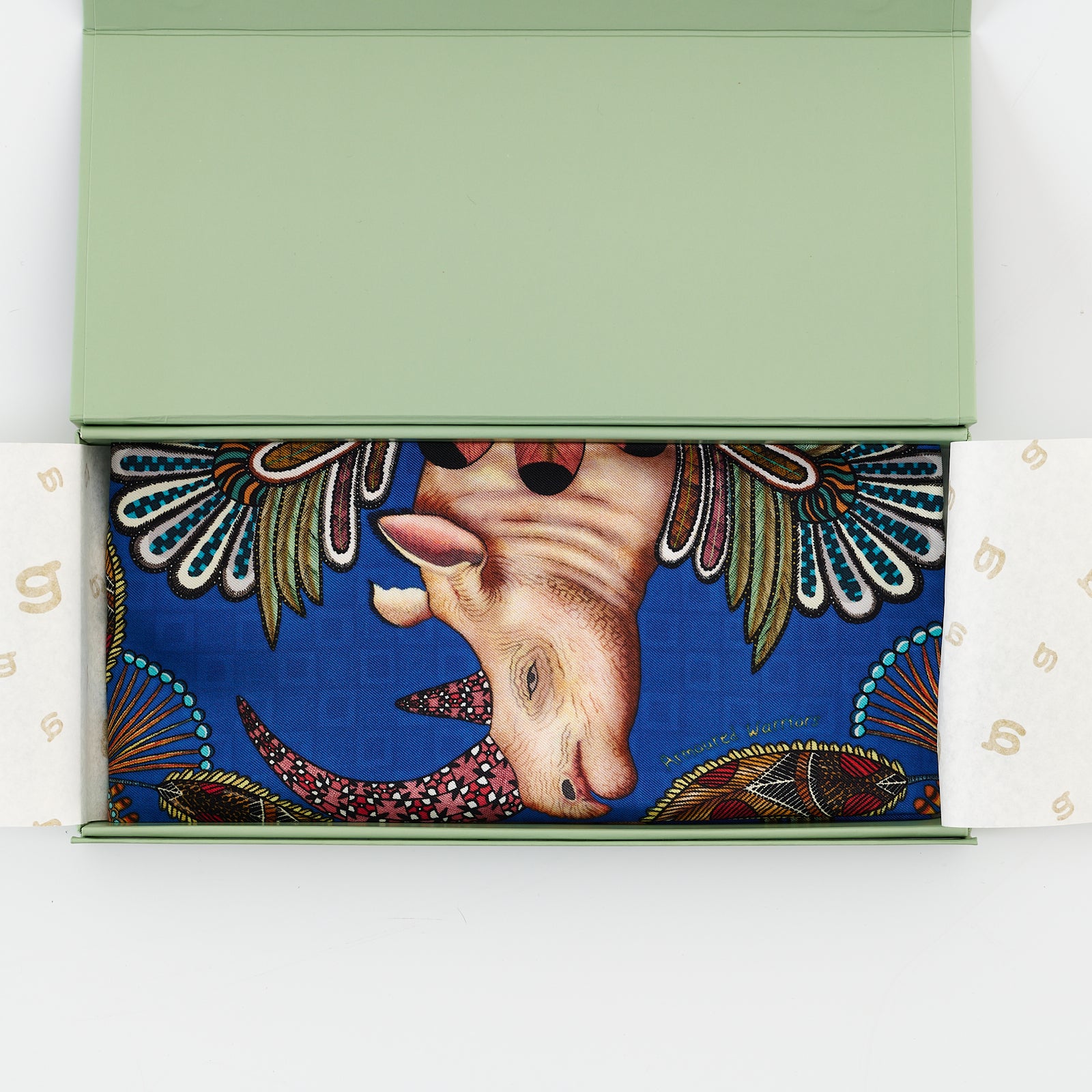 The pocket square elegantly folded inside a sleek, high-end presentation box, perfect for gifting or storage.