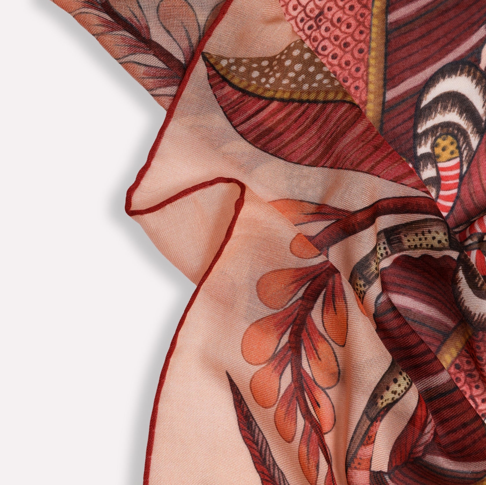 A styled image of the scarf elegantly folded, demonstrating its soft, lightweight fabric and fluid drape.