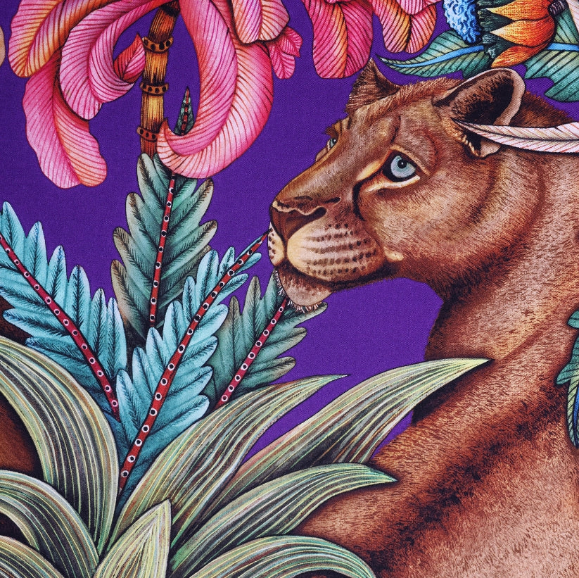 A zoomed-in view capturing the elegant face of one of the lionesses, highlighting the fine details of the artwork.