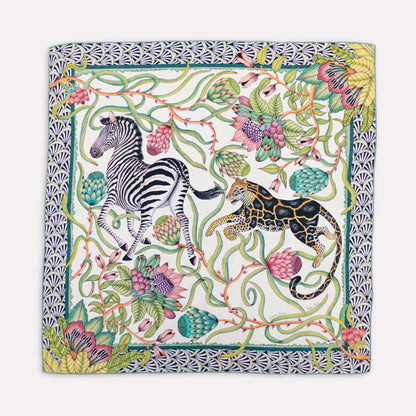 A detailed look at the scarf’s edge, showing the seamless blend of geometric patterns and botanical elements.