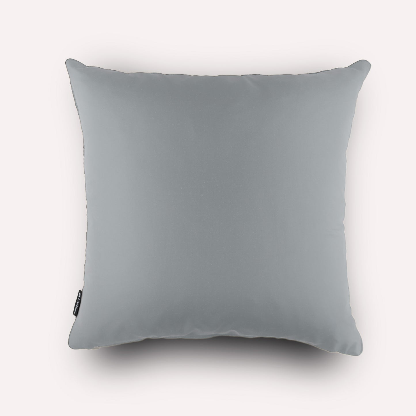 Back view of the Thanda Pangolin in Ash Silk Cushion Cover, featuring plain ash grey silk with refined piping detail.