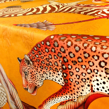 A tight shot focusing on a pangolin with bold striped patterns, demonstrating the textile’s striking visual contrast.