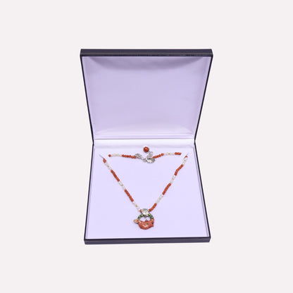 Coral Rhino with Leaf Bale Necklace