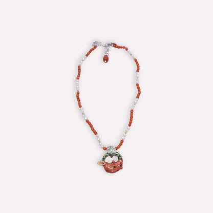 Coral Rhino with Leaf Bale Necklace