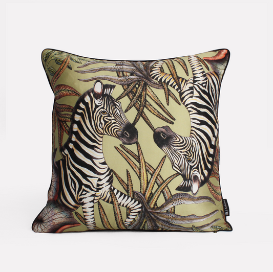 Front view of the Thanda Stripe Delta Silk Cushion Cover showcasing majestic zebras amidst a warm Delta colour palette, crafted on luxurious silk fabric.