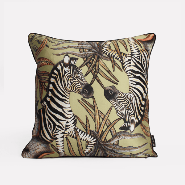 Front view of the Thanda Stripe Delta Silk Cushion Cover showcasing majestic zebras amidst a warm Delta colour palette, crafted on luxurious silk fabric.