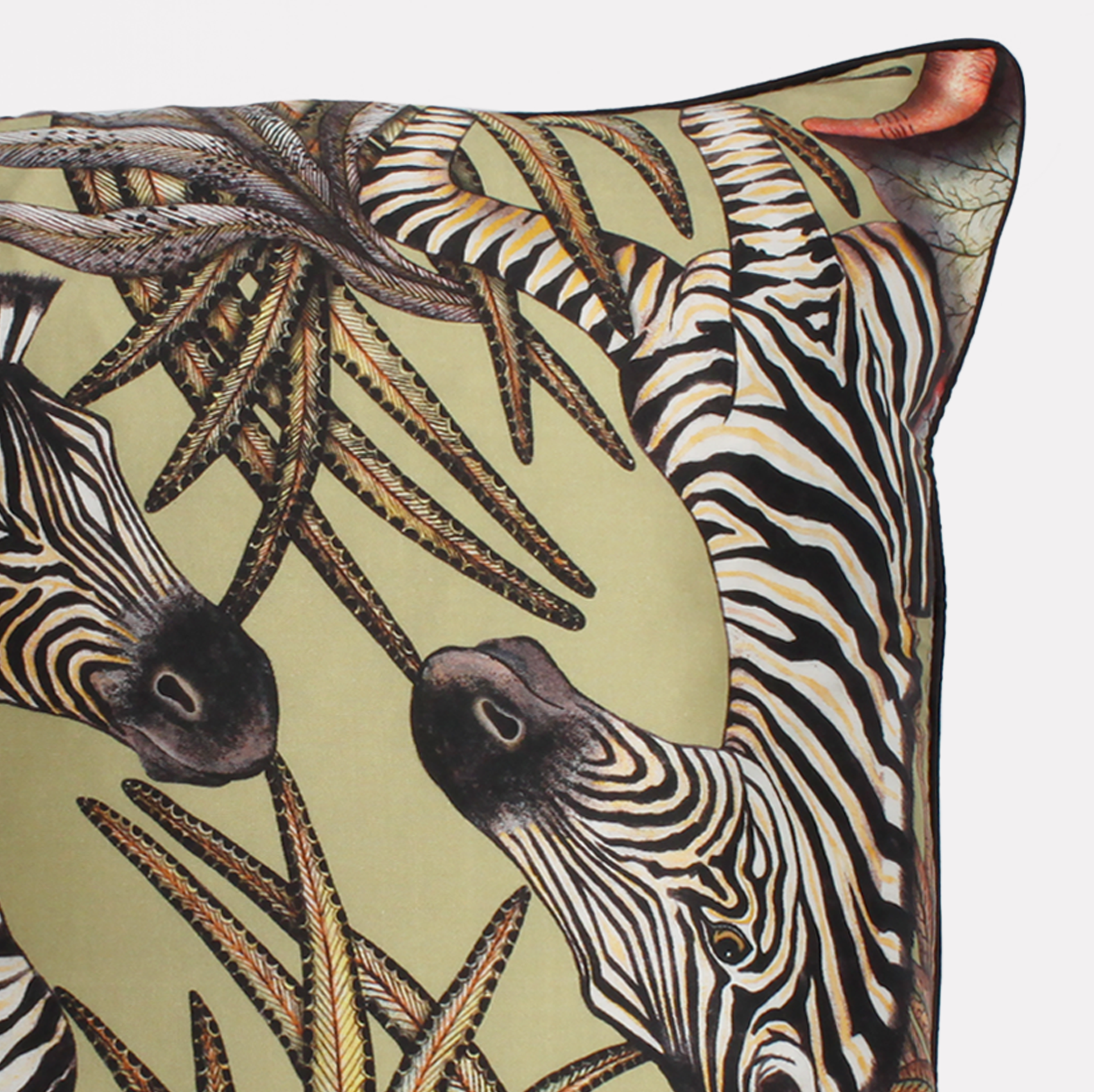 Angled close-up of the Thanda Stripe Delta Silk Cushion Cover, accentuating the vibrant details and soft texture of the silk fabric