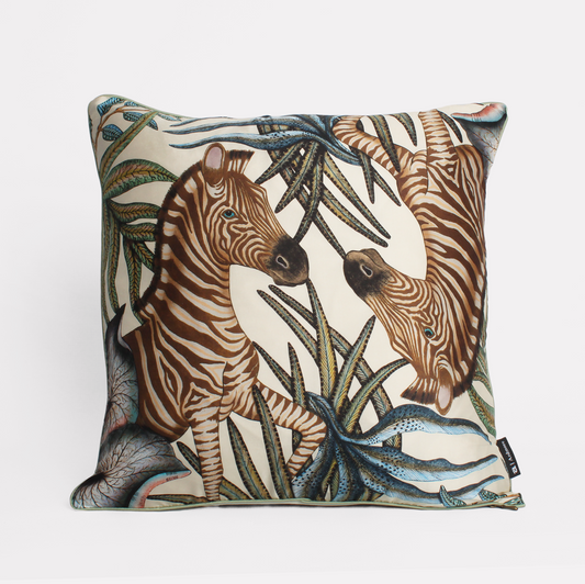 Front view of the Thanda Stripe Tanzanite Silk Cushion Cover featuring two zebras amidst vibrant Tanzanite hues, printed on luxurious silk fabric.