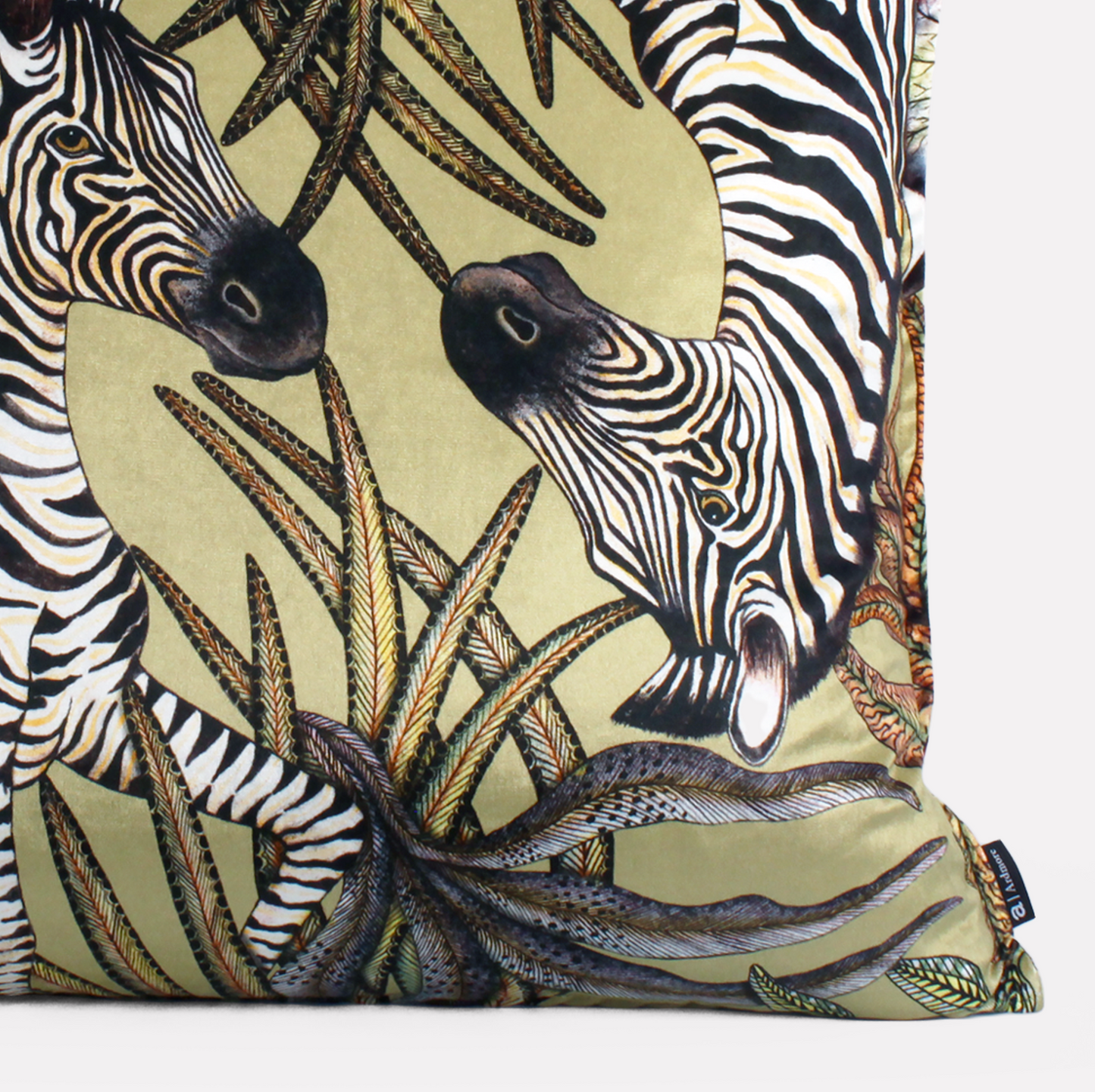 Angled side view of the Thanda Stripe Delta Velvet Cushion Cover, showcasing the detailed double-sided print and bold top stitch finish.