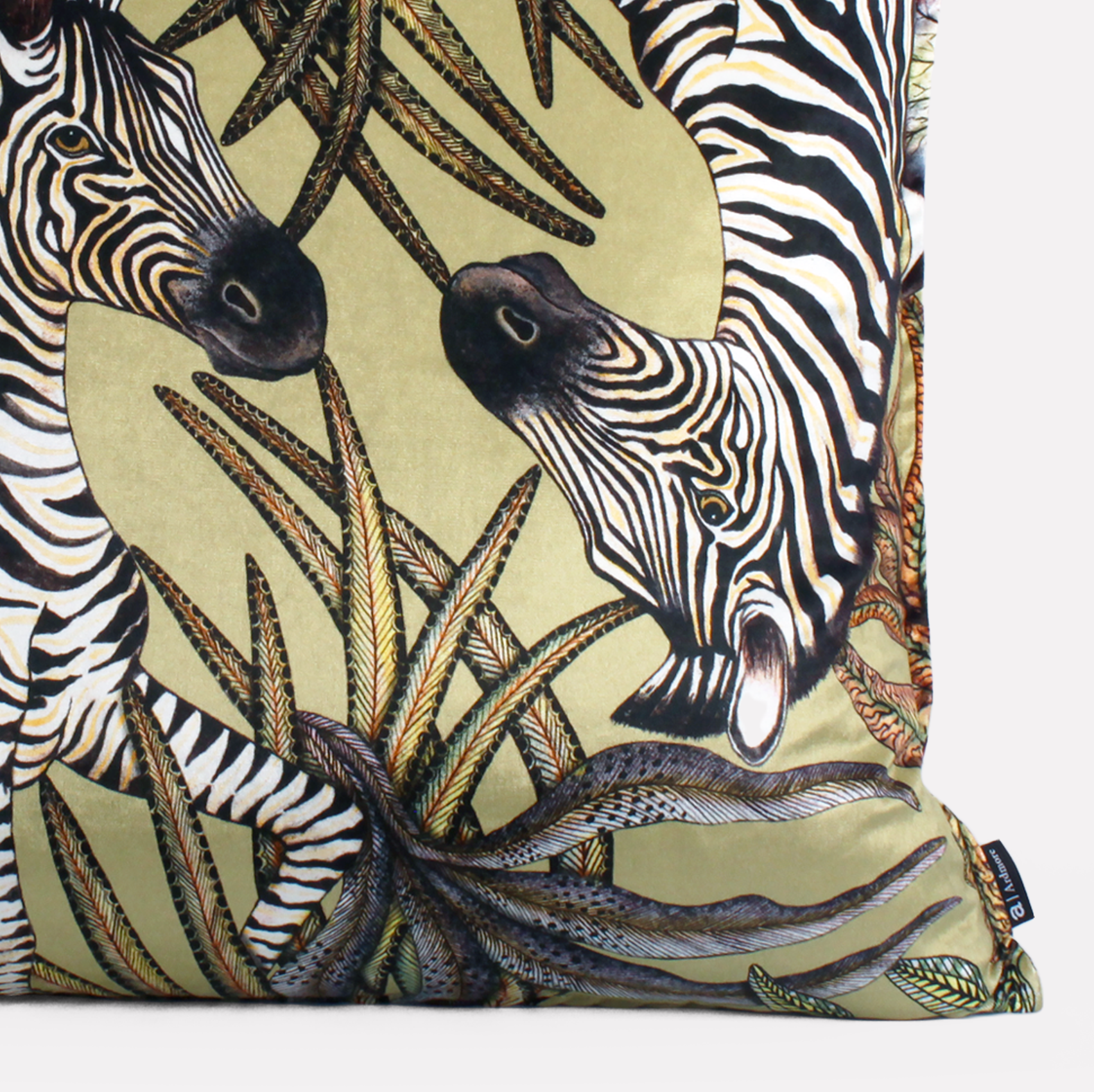 Angled side view of the Thanda Stripe Delta Velvet Cushion Cover, showcasing the detailed double-sided print and bold top stitch finish.