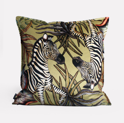 Close-up view of the Thanda Stripe Delta Velvet Cushion Cover, emphasising the harmonious zebra illustrations and vivid colour palette.