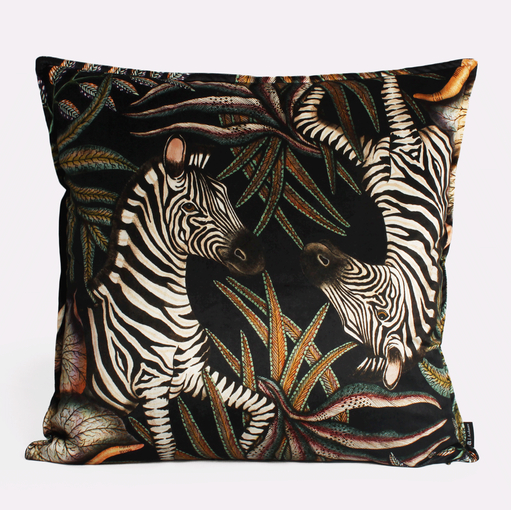 Front view of the Thanda Stripe Night Velvet Cushion Cover featuring a striking zebra design amidst dark foliage, crafted on luxurious velvet fabric.