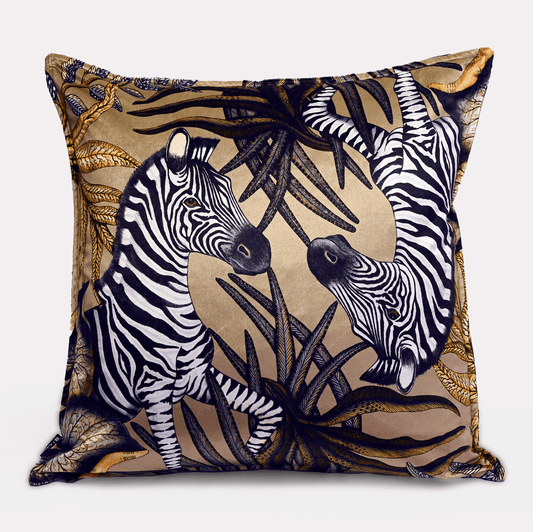 Front view of the Thanda Stripe Savannah Velvet Cushion Cover, featuring bold zebra illustrations set against a warm savannah gold backdrop.