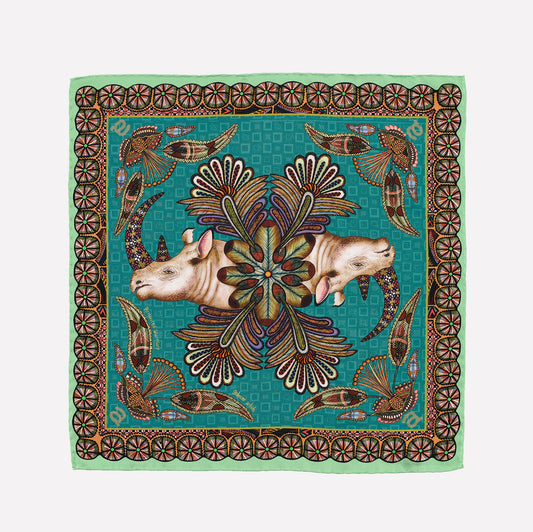 A luxurious silk pocket square in a rich green hue, adorned with two mirrored rhinos surrounded by intricate floral and circular Zulu-inspired patterns.