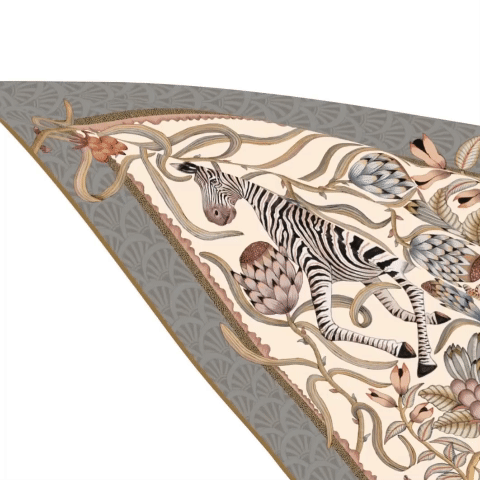 A live close-up of the scarf flowing to highlight its lightweight texture, delicate colour transitions, and fine craftsmanship.