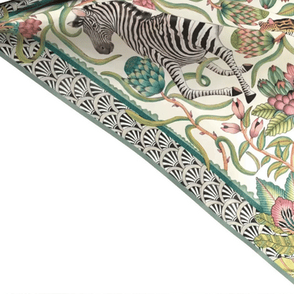 A draped version of the scarf showing the silk’s fluidity, how it folds naturally, and how the pattern moves with the fabric.