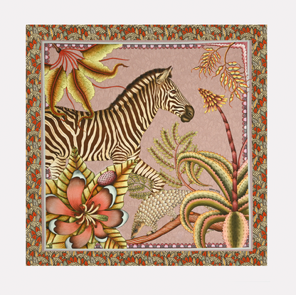 A full view of the Ardmore Thanda Stripe Napkin in Magnolia, featuring a zebra and pangolin among lush African flora, framed by an intricate patterned border in soft pink and earthy tones.
