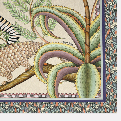A close-up of the pangolin and surrounding floral details on the Ardmore Thanda Stripe Napkin in Stone, illustrating the artistic craftsmanship.