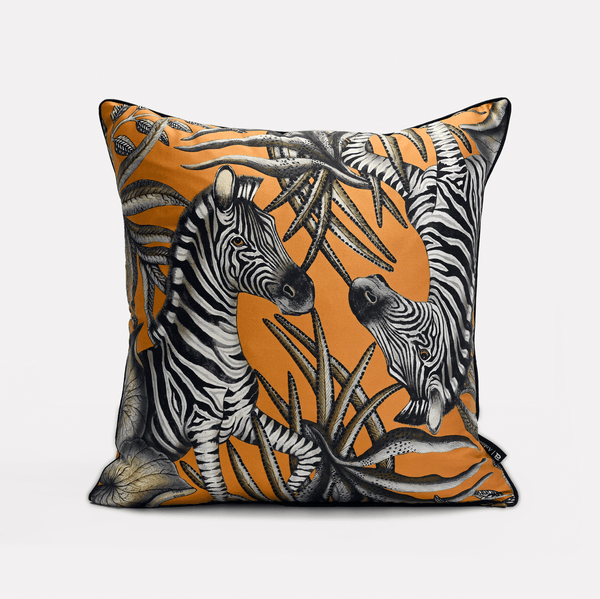 Front view of the Thanda Stripe Flame Silk Cushion Cover showcasing a striking zebra design against a vibrant flame orange background, crafted on luxurious silk fabric.