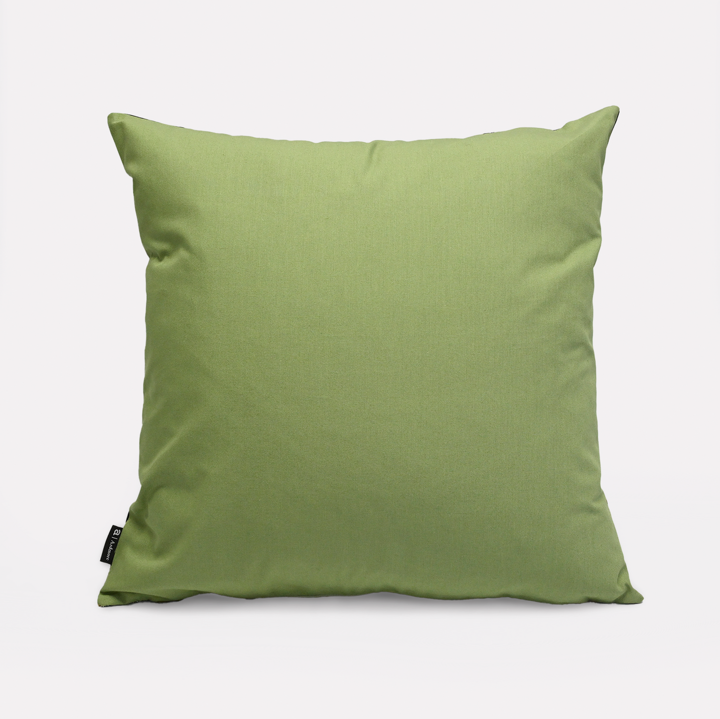 Back view of the Thanda Stripe Tanzanite Cotton Cushion Cover, featuring a solid green fabric for a clean, minimalist look