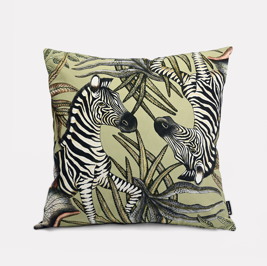 Front view of the Thanda Stripe Delta Cotton Cushion Cover, showcasing an elegant zebra design amidst lush African-inspired foliage on a soft beige background.