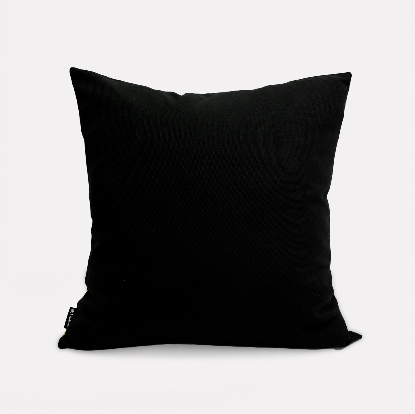 Reverse side of the Thanda Stripe Delta Cotton Cushion Cover in a classic black cotton fabric, highlighting its versatile and sleek design.