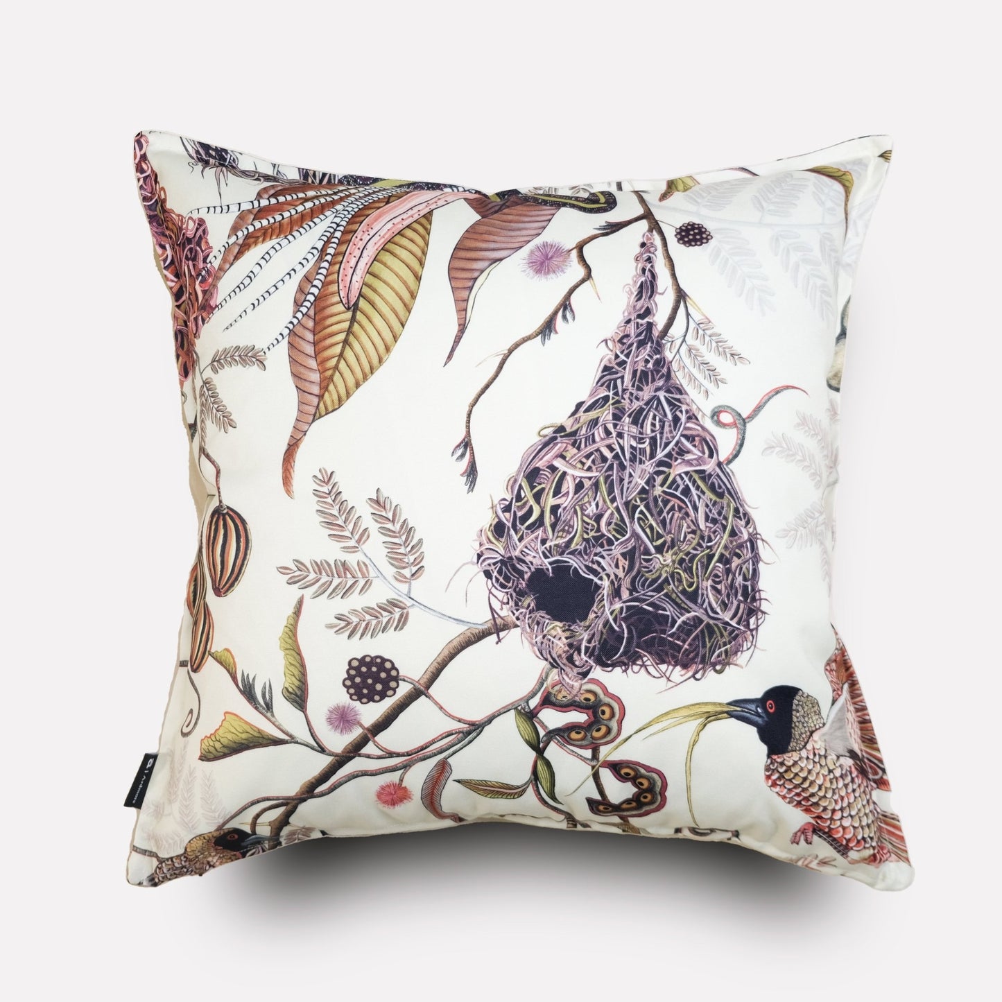 Front view of the Thanda Nests Plum Outdoor Cushion Cover, showcasing a delicate bird nest-inspired design with plum and neutral tones on a white background.